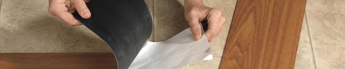 A professional installing vinyl flooring in Portland, OR